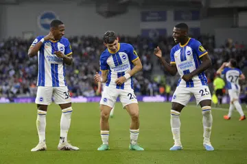 TARI RIA: Pemain Brighton, Julio Enciso (tengah) meraikan gol yang dijaringkannya semasa menentang Manchester City dengan disertai dua rakan sepasukan. 