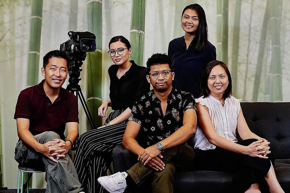 DI SEBALIK TABIR: Pasukan Sweet di sebalik filem pendek 'Sunyi' yang dihasilkan bagi Zakat SG termasuk (dari kiri) Encik Ted Chen, Cik Elvina Farkas, Encik Khidhir Kassim, Cik Katherine Goh dan Cik Chia Noi Kheng. - Foto BH oleh TED CHEN