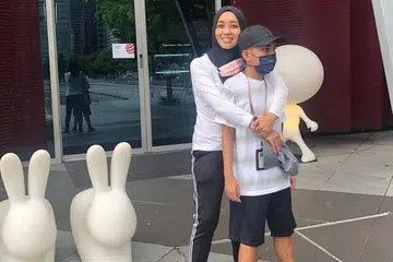 FIKIRKAN PENJAGAAN ANAK: Cik Siti Aminah Mansoor telah membuka akaun dana amanah yang diuruskan oleh Syarikat Amanah Keperluan Khas (SNTC) untuk anak lelaki bongsunya yang menghidap autisme. - Foto ihsan SITI AMINAH MANSOOR