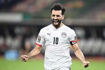 WIRA MESIR: Mo Salah kegembiraan menjadi wira Mesir selepas menyempurnakan tendangan penalti penentuan yang membawa kemenangan 5-4 ke atas Ivory Coast dan tiket ke suku akhir Piala Negara-Negara Afrika. - Foto AFP