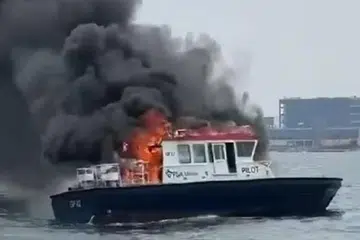 TERBAKAR: Pengendali pelabuhan PSA berkata kebakaran berlaku di bilik enjin bot pemandu kapal PSA Marine.