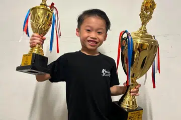 Ahmad Yusuf Ahmad Bahrain, enam tahun, muncul juara Kejohanan Beyblade G1 Singapura bagi kategori ‘Regular’ dan kemudian merangkul gelaran juara Piala Asia Tenggara (SEA Cup) G1 Regular pada 11 dan 12 Julai lalu.