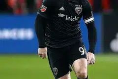 PEMAIN TUNGGAK: Wayne Rooney dianggap sebagai pemain penting yang menyumbang besar kepada DC United semasa bermain di Amerika Syarikat. - Foto AFP