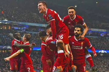 KEMENANGAN HEBAT: Para pemain Liverpool meraikan kemenangan cemerlang dengan menyingkirkan Manchester City dan mengorak langkah ke separuh akhir Liga Juara-Juara. - Foto AFP 
