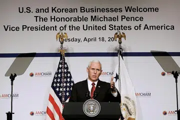 KETENGAHKAN ISU DAGANG: Naib Presiden Mike Pence berucap kepada anggota Dewan Perniagaan Amerika di Seoul semalam. - Foto REUTERS