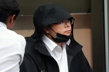 Suwandi Marchuke kelihatan meninggalkan mahkamah pada 27 Mac 2023. - 