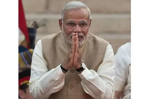ENCIK MODI: Dapat jatuhkan Parti Kongres India dan keluarga Gandhi dengan menampilkan dirinya sebagai seorang rakyat biasa daripada keluarga susah tetapi mempunyai impian besar. - Foto AFP