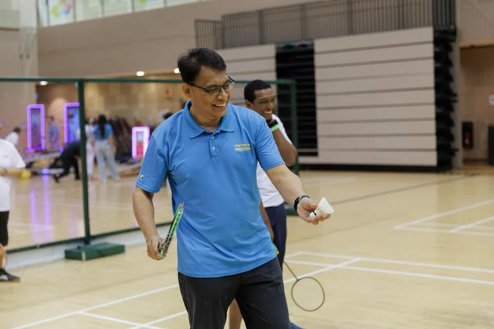 Ketua Eksekutif MUIS, Encik Kadir Maideen, semasa pertandingan badminton di Our Tampines Hub pada 13 September.