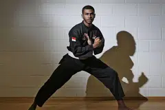 MENJADI HARAPAN NEGARA: Sheik Farhan menjadi antara pesilat harapan negara untuk membolot pingat emas di Kejohanan Pencak Silat Sedunia ke-18 setelah berjaya menjadi juara dunia dua kali berturut-turut. - Foto fail 