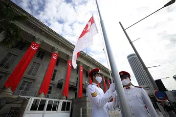 NAIKKAN BENDERA SINGAPURA: Upacara menaikkan bendera Singapura akan diadakan di lapan lokasi serata Singapura secara serentak pada 10.30 pagi termasuk di Padang (gambar). - Foto NDP2020 EXCO 