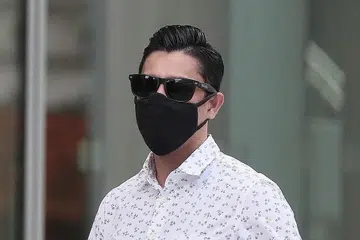 DIPENJARA DAN DIDENDA: Mohammad Imran Sahib Mohamed Ibrahim Sahib dikenakan penjara 18 bulan dan didenda $1,000 atas kesalahan termasuk mencabul kehormatan teman pasangan Tindernya. - Foto BH oleh KELVIN CHNG