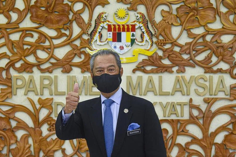 INGIN KEMBALIKAN MANDAT RAKYAT: Perdana Menteri Malaysia, Tan Sri Muhyiddin Yassin, memberi jaminan mandat rakyat akan dikembalikan untuk memilih kerajaan menerusi Pilihan Raya Umum sebaik sahaja pandemik Covid-19 berakhir di negara itu. - Foto EPA-EFE/ZARITH ZULKIFLI 