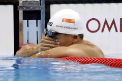 KECEWA: Quah Zheng Wen kecewa gagal melayakkan diri ke final sekalipun muncul sebagai perenang ke-10 terpantas bagi acaranya. - Foto THE STRAITS TIMES