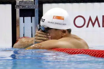 KECEWA: Quah Zheng Wen kecewa gagal melayakkan diri ke final sekalipun muncul sebagai perenang ke-10 terpantas bagi acaranya. - Foto THE STRAITS TIMES