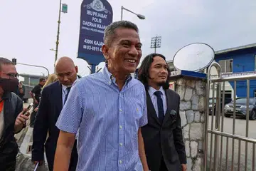 BERI KETERANGAN: Bekas Ketua Pengarah, Jabatan Komunikasi Komuniti (J-KOM), Datuk Dr Mohammad Agus Yusoff, ketika hadir memberi keterangan di Ibu Pejabat Polis Daerah (IPD) Kajang pada 20 November. 