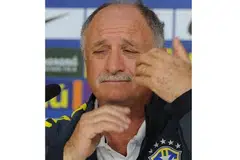 SAAT KEJATUHAN: Brazil di bawah pimpinan Scolari musnah 1-7 di tangan Jerman di separuh akhir Piala Dunia 2014. - Foto AFP