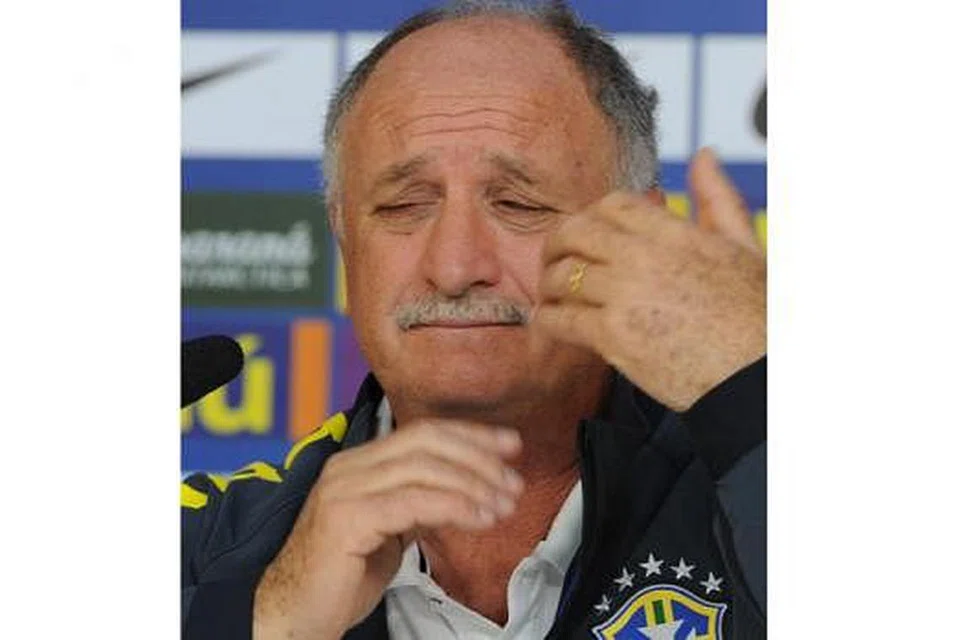 SAAT KEJATUHAN: Brazil di bawah pimpinan Scolari musnah 1-7 di tangan Jerman di separuh akhir Piala Dunia 2014. - Foto AFP