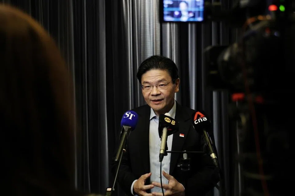 Perdana Menteri Encik Lawrence Wong bercakap kepada media Singapura pada 25 Jun.