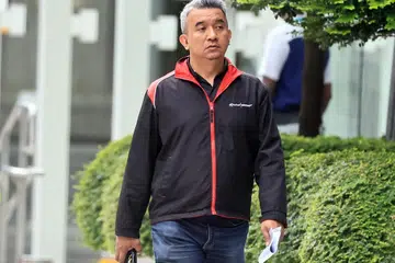 Zulkifli Kader, 51 tahun, warga Malaysia yang tidak lagi bekerja dengan Yayasan Mendaki, dituduh melakukan kesalahan tersebut dalam tiga kejadian antara April dengan Mei 2023.