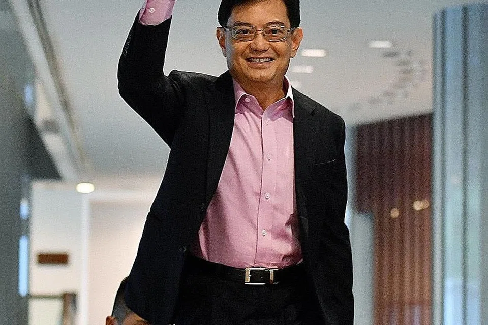 BENTANG BELANJAWAN: Timbalan Perdana Menteri merangkap Menteri Kewangan, Encik Heng Swee Keat membentangkan Belanjawan di Parlimen semalam. - Foto BH oleh CHONG JUN LIANG