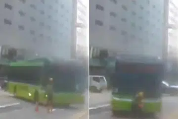 Pekerja binaan sedang meletakkan kon lalu lintas di sepanjang  Anson Road apabila nahas berlaku pada 27 Jun.