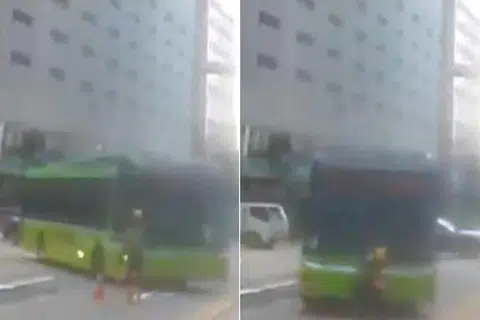 Pekerja binaan sedang meletakkan kon lalu lintas di sepanjang  Anson Road apabila nahas berlaku pada 27 Jun.
