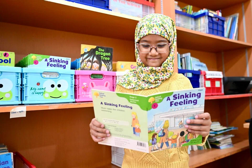 Naila Naima Muhammad Taufiq telah mencatat banyak kemajuan dalam membaca dan mengeja sejak mengikuti kelas di Persatuan Disleksia Singapura (DAS).
