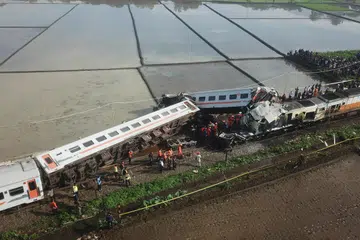 NAHAS KERETA API: Pemandangan dari udara menunjukkan kesan perlanggaran antara dua kereta api di Cicalengka, Bandung, wilayah Jawa Barat, pada 5 Januari. 