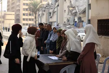 Pelajar kembali menghadiri kuliah di Universiti Islam Gaza, di tengah Jaluran Gaza pada 29 November.