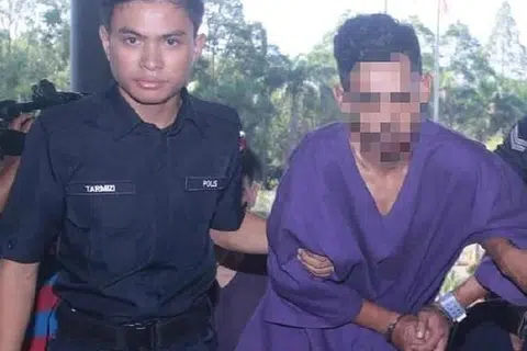 DIREMAN: Seorang lelaki warga Singapura (kanan), 31 tahun, direman Polis Diraja Malaysia kerana disyaki terbabit dalam kes pembunuhan kejam di Kampung Ladang, Krubong, di Melaka, di mana mayat dua mangsa ditemui dikerat sekurang-kurangnya lapan bahagian pada Khamis (10 Oktober). -Foto MyMetro. 