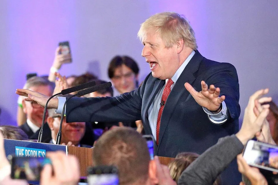 MENANG BESAR: Parti Konservatif pimpinan Encik Boris Johnson meraih 363 kerusi, memberikannya bilangan kerusi majoriti di Parlimen yang diperlukannya bagi melaksanakan Brexit pada 31 Januari 2020. - Foto REUTERS