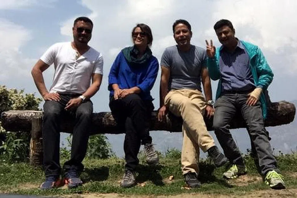 SEDIA MEMBANTU: Pasukan di sebalik usaha Nepal Earthquake Village Aid. (Dari Kiri) Encik Fanindra Shresta, Cik Murni Mastan, Encik Binaya Shresta dan Encik Santosh Rajbhandari. Gambar ini dipetik di Kampung Shivapuri, di pinggir Kathmandu sehari sebelum gempa bumi pada 25 April. - Foto ihsan CIK MURNI