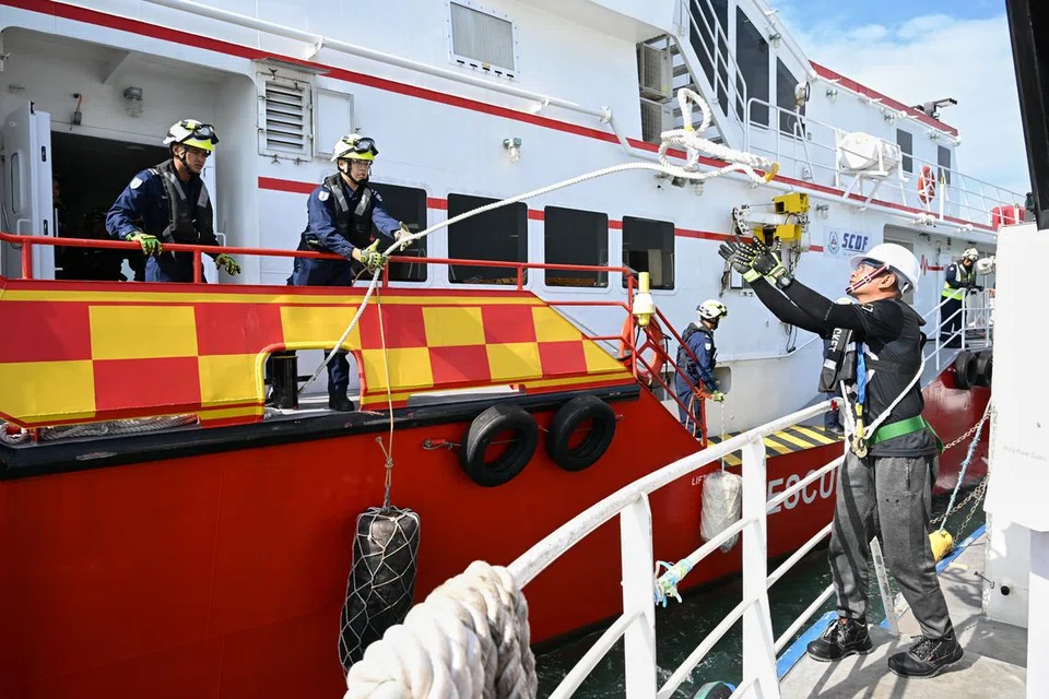 Pegawai Pasukan Pertahanan Awam Singapura (SCDF) mengambil bahagian dalam Latihan Menyelamat Feri (Ferex) yang melibatkan pelbagai agensi pada 22 Ogos.