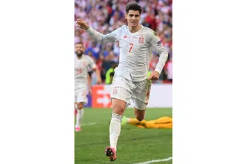 PASTIKAN KEMENANGAN: Penyerang Sepanyol, Alavaro Morata, meraikan jaringannya, yang juga gol keempat negaranya.