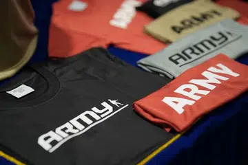 Beberapa produk eMart yang kini tersedia di Lazada termasuk peralatan ketenteraan, pakaian dan kasut. - AQIL HAMZAH