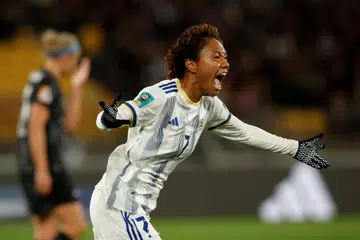 JARING GOL: Sarina Bolden meraikan gol kemenangannya setelah menanduk masuk bola ke dalam gawang.