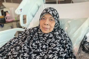 Siti Aminah Siregar dirawat di Hospital Tan Tock Seng sejak 11 Disember kerana penyakit selulitis kaki – jangkitan bakteria yang menjejas lapisan kulit – yang dihadapinya lebih lima tahun lalu.