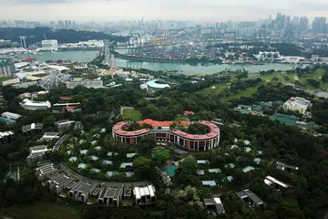 TUAN RUMAH: Acara renang gaya bebas dan terjun indah, masing-masing bakal diadakan di kawasan Marina Bay dan Sentosa.