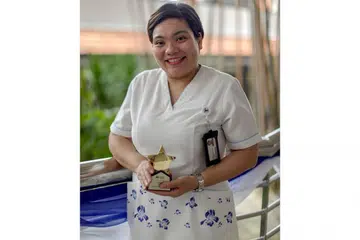 PEMBAKAR SEMANGAT PESAKIT: Jururawat kanan, Cik Siti Khatijah Ibrahim, teruja dengan setiap peluang membantu pesakit mental di Institut Kesihatan Mental (IMH) keluar daripada kepompong kemurungan atau ketidakselesaan sehingga mereka lebih aktif bergaul. - Foto BH oleh IQBAL FAIZAL