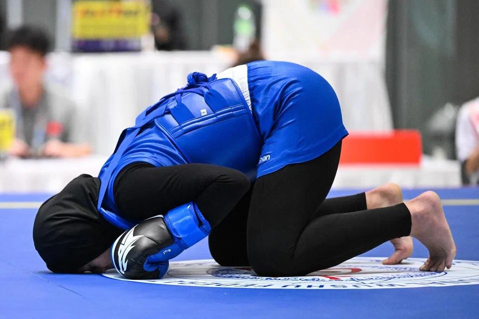 Walaupun mengukir sejarah sukan negara dengan memenangi pingat pertama bagi acara sanda wanita, Siti Khadijah Mohamad Shahrem, tetap kecewa tidak dapat melangkah ke acara akhir. 