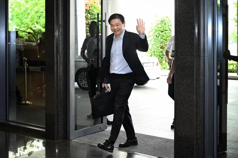Perdana Menteri, Encik Lawrence Wong, semasa tiba di Parlimen pada 18 Februari, bagi membentangkan Belanjawan 2025.