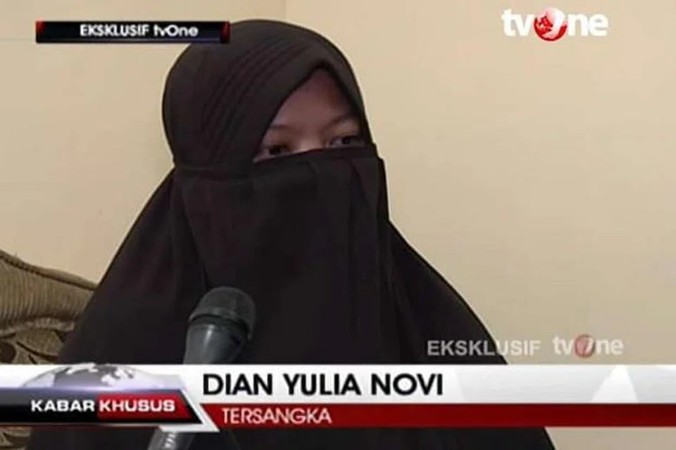 RANCANG BOM ISTANA: Dian Yulia Novi, 27 tahun, yang pernah bekerja di Singapura sebagai pembantu rumah, ditahan dalam serbuan antikeganasan minggu lalu kerana merancang menyerang istana Presiden di ibu kota Indonesia itu. - Foto THE STAR