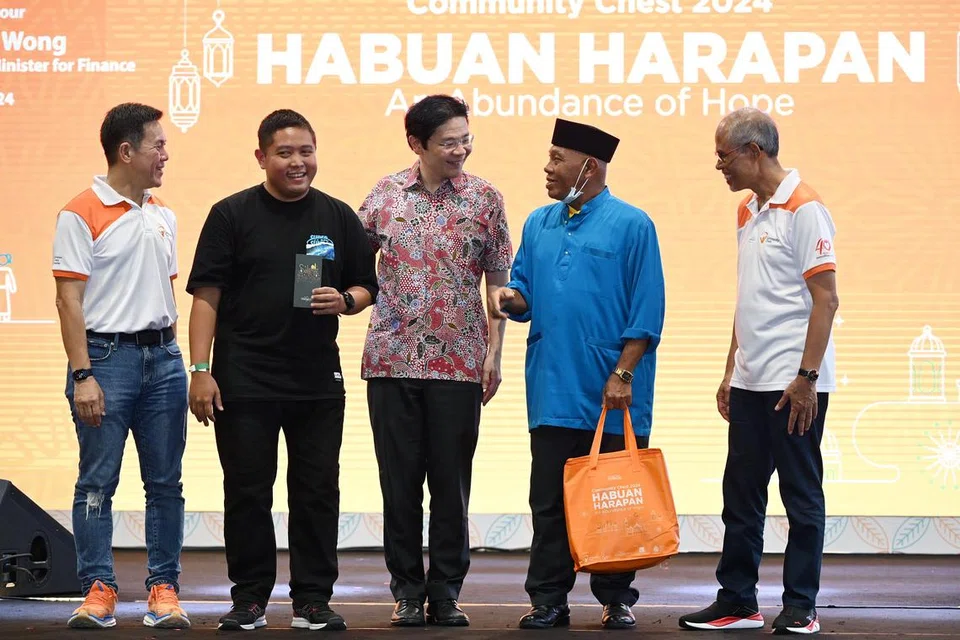Encik Lawrence Wong (tengah) merupakan tetamu terhormat acara Habuan Harapan Dana Masyarakat 2024, yang diadakan buat julung-julung kalinya semasa Ramadan pada Mac 2024. Seramai 5,000 keluarga Melayu/Islam dari 19 kawasan di serata Singapura meraih manfaat daripada habuan yang diagihkan. 