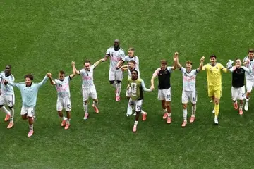 Pemain Belgium meraikan kemenangan 3-2 hasil kebangkitan ke atas Senegal untuk mara ke pusingan 16 terakhir.