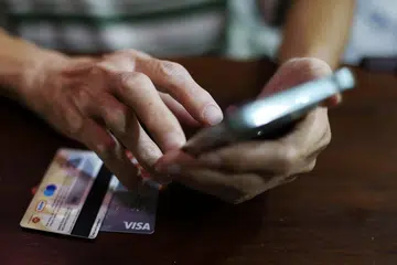 Keldai wang, dihalang daftar talian telefon, akses khidmat bank, Singpass