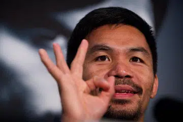 BERTARUNG DI MALAYSIA: Peminat bintang tinju Filipina, Manny Pacquiao, boleh menjangkakan penampilannya di Malaysia sekitar Mei atau Jun ini. - Foto AFP