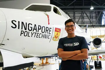 INGIN BANGGAKAN IBU BAPA: Sheikh Arfahmi Sheikh Arzimi yang tampil sebagai pelajar terbaik kursusnya ingin membanggakan ibu bapanya dengan melangkah ke universiti dan berjaya mendapat biasiswa. - Foto POLITEKNIK SINGAPURA