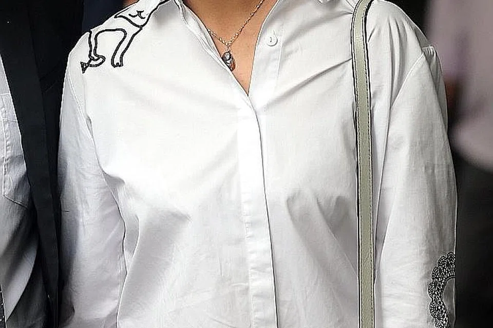 PERGOLAKAN KELUARGA: Tan Nam Seng tidak senang dengan cara menantunya, Encik Spencer Tuppani, memperlakukan anak perempuannya, Cik Shyller Tan (gambar atas), lalu menikam menantunya itu di Boon Tat Street hingga membawa maut. - Foto fail