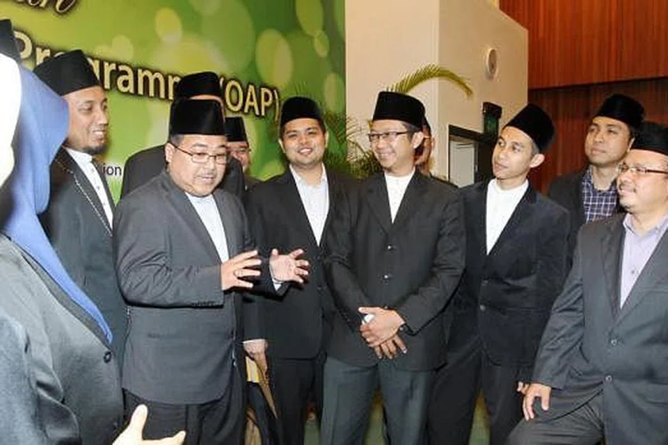PROGRAM MENDEDAHKAN ASATIZAH KEPADA ISU KONTEMPORARI: Antara asatizah yang terpilih mengikuti program luar negara di Darul Ifta, sebuah institusi fatwa terkemuka di Kahirah, Mesir, pada 2013. - Foto fail