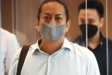 DIKENAKAN TUDUHAN: Kakitangan NEA, Christopher Lee Yew Binn, dikenakan satu tuduhan di bawah Akta Keselamatan dan Kesihatan di Tempat Kerja berkaitan letupan di Loji Pembakaran Sampah Tuas (TIP) pada 2021.